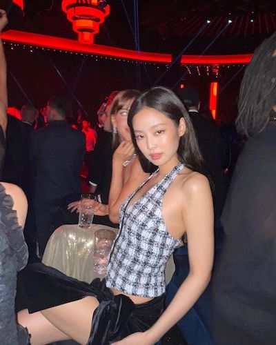 Image: Jennie wearing plaid vest top 